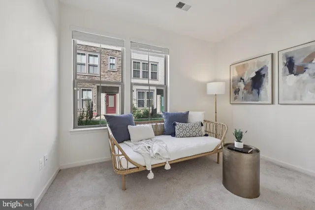 a bathroom with a sink toilet and a mirror
