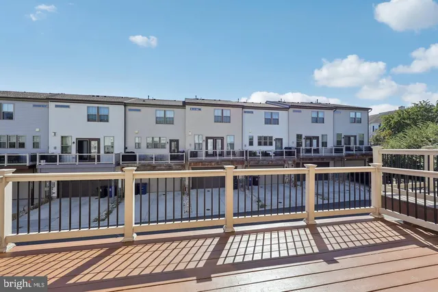 a picture of a bench in a white wall