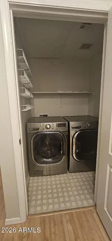 a bathroom with a toilet a sink and bathtub