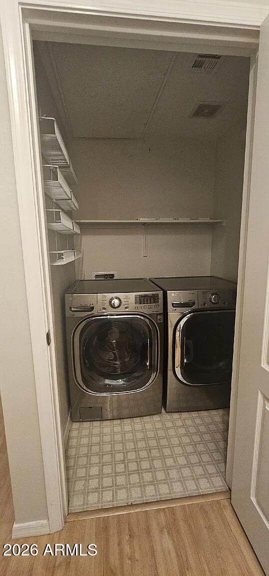 1701 East Colter Street, Unit 263 Phoenix, AZ 85016 - Photo 11 of 65 a utility room with dryer and washer
