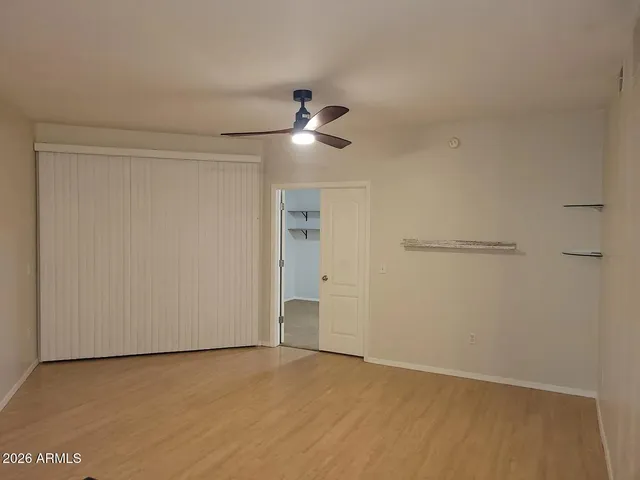 a bathroom with a mirror and bathtub