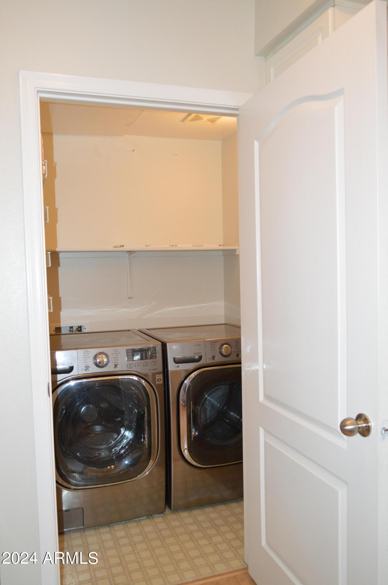 1701 East Colter Street, Unit 263 Phoenix, AZ 85016 - Photo 35 of 65 a close up view of a washer and dryer