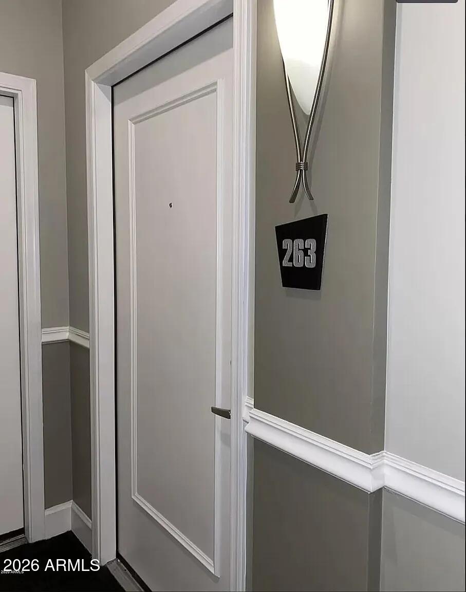 1701 East Colter Street, Unit 263 Phoenix, AZ 85016 - Photo 58 of 65 a view of a hallway with a door