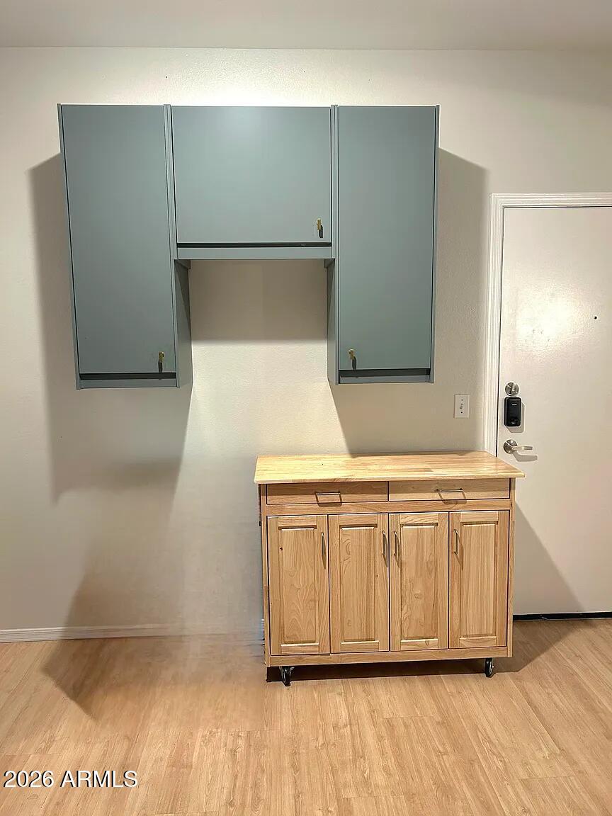 1701 East Colter Street, Unit 263 Phoenix, AZ 85016 - Photo 9 of 65 a bathroom with a sink and a mirror