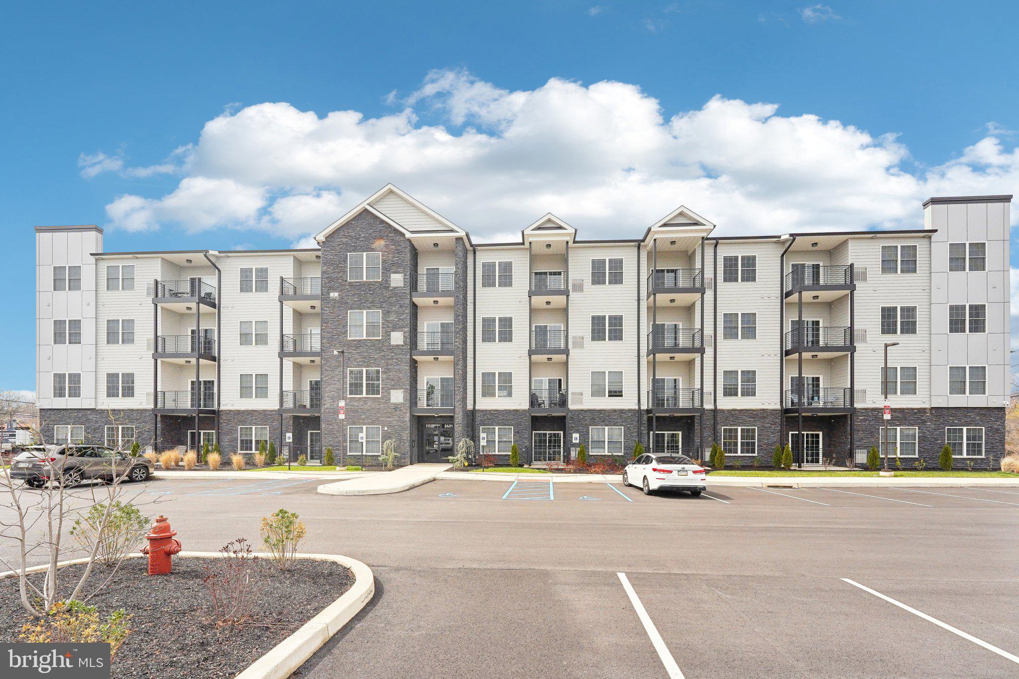 2421 Bristol Road, Unit 2B100 Warrington, PA 18976 - Photo 7 of 50 a view of tall buildings