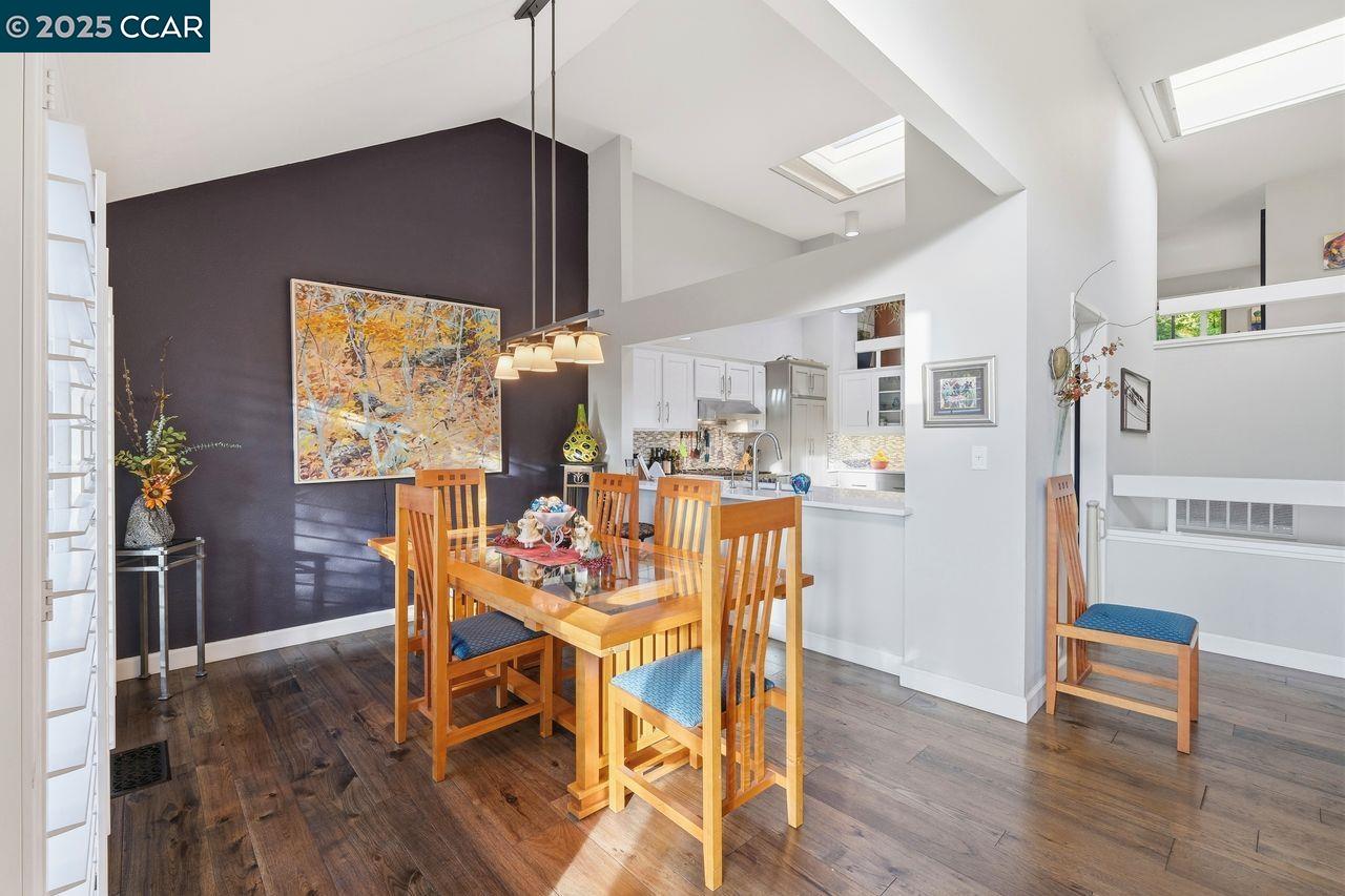 533 Monarch Ridge Drive Walnut Creek, CA 94597 - Photo 14 of 43 a living room with dining room and wooden floor