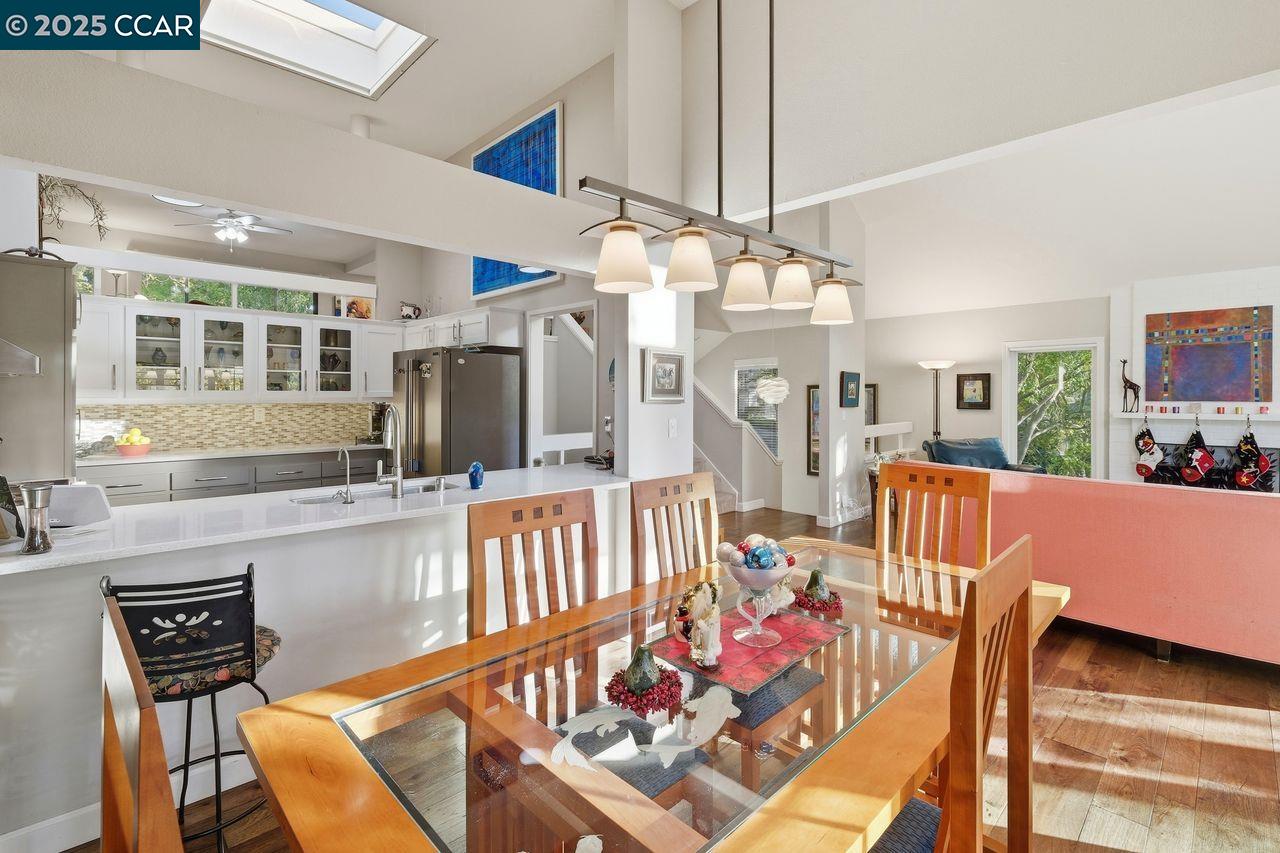 533 Monarch Ridge Drive Walnut Creek, CA 94597 - Photo 15 of 43 a living room with furniture kitchen view and a large window