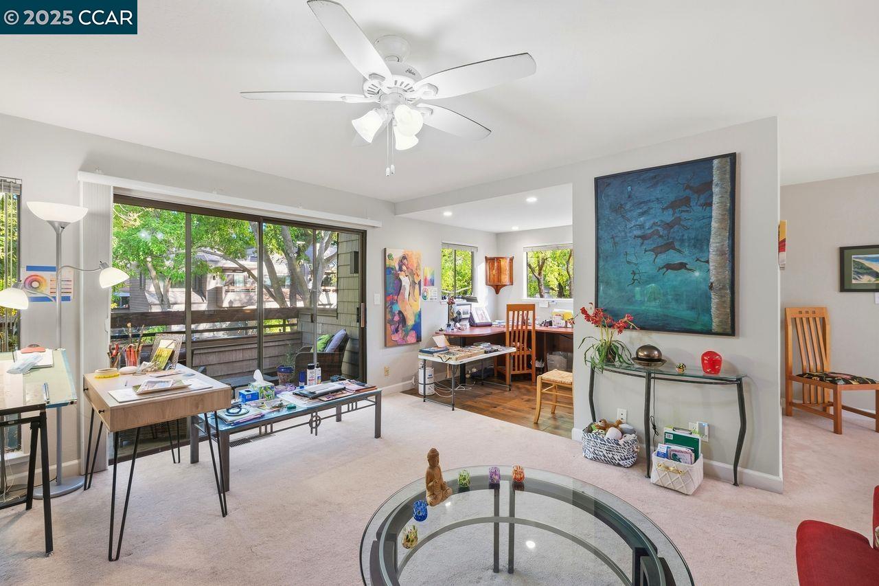 533 Monarch Ridge Drive Walnut Creek, CA 94597 - Photo 19 of 43 a living room with furniture and a large window