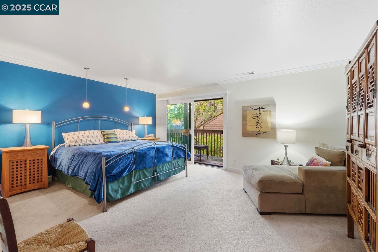 533 Monarch Ridge Drive Walnut Creek, CA 94597 - Photo 21 of 43 a bedroom with a bed and a couch