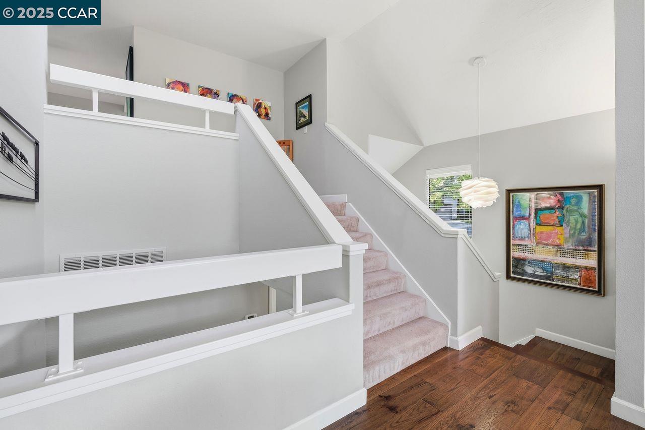 533 Monarch Ridge Drive Walnut Creek, CA 94597 - Photo 5 of 43 a view of entryway with stairs and wooden floor
