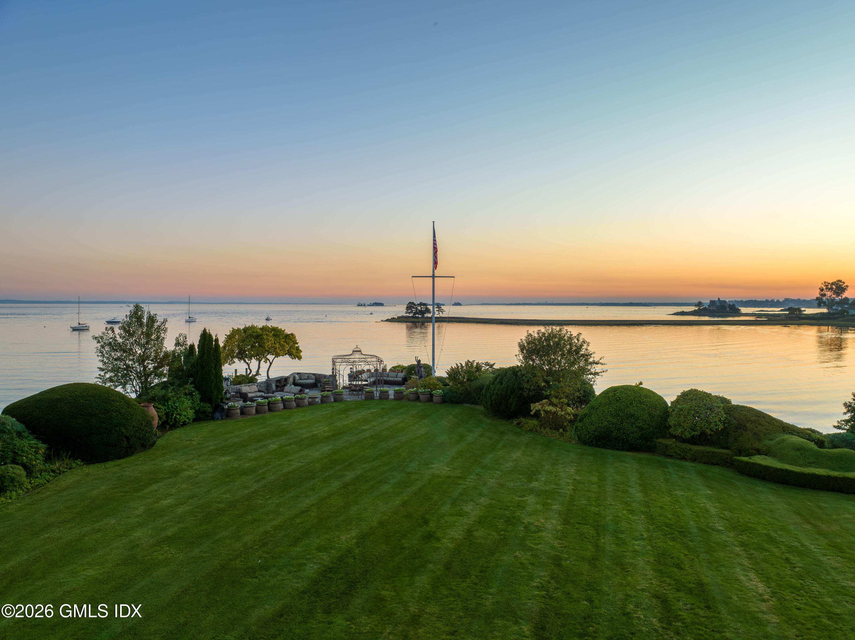 108 Cedar Cliff Road Riverside, CT 06878 - Photo 48 of 49 a view of a lake with a big yard