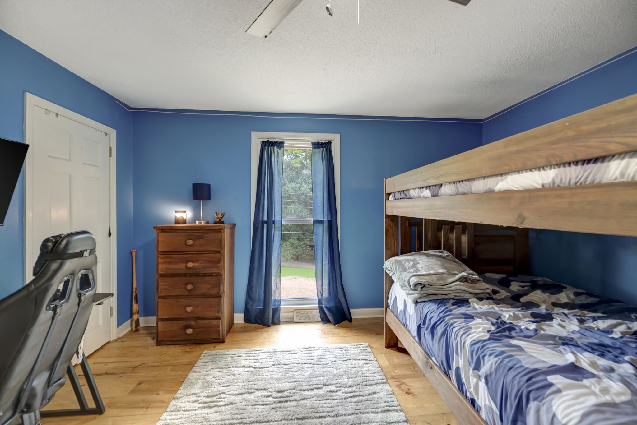 6125 Highway 41 A Pleasant View, TN 37146 - Photo 14 of 32 a bedroom with a bed and a mirror