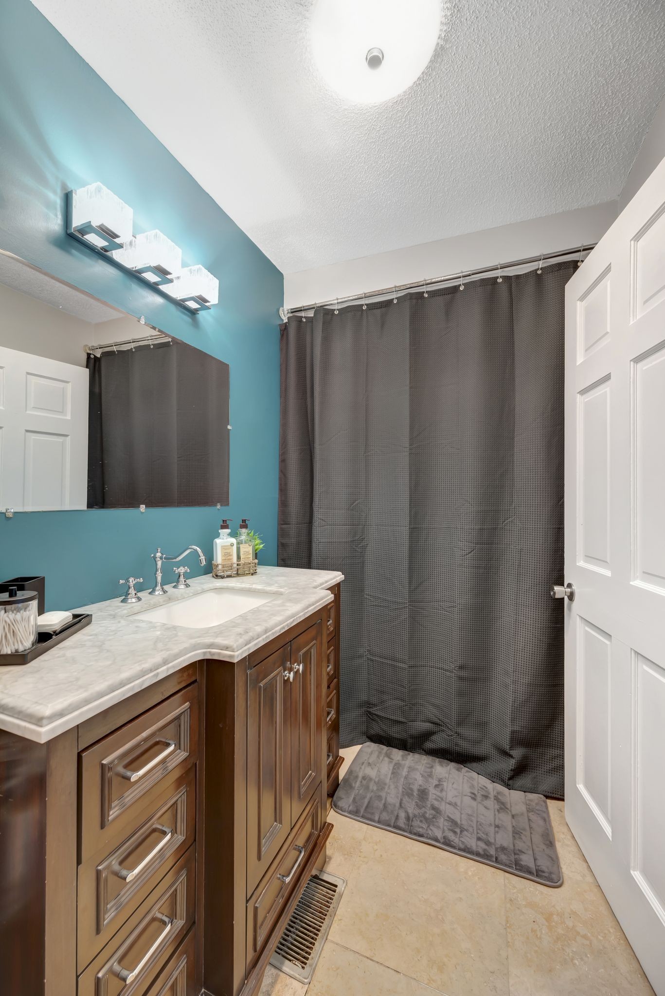 6125 Highway 41 A Pleasant View, TN 37146 - Photo 20 of 32 a spacious bathroom with a sink a mirror and a shower