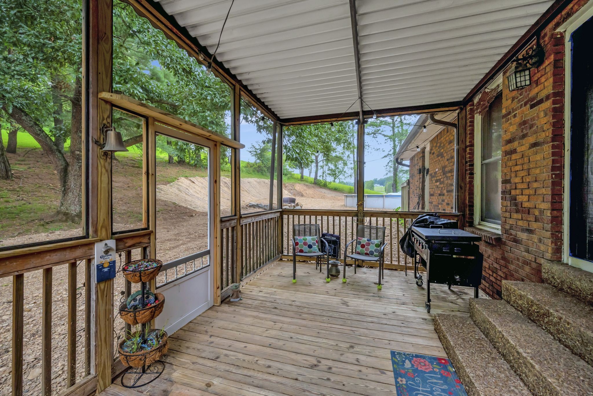 6125 Highway 41 A Pleasant View, TN 37146 - Photo 26 of 32 a view of a chairs and table in the balcony