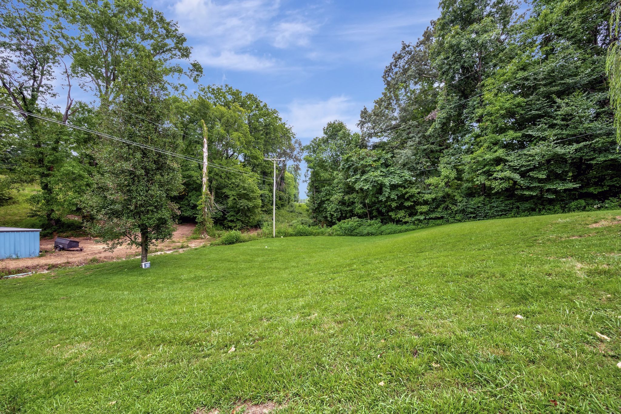 6125 Highway 41 A Pleasant View, TN 37146 - Photo 32 of 32 a view of a backyard with a garden