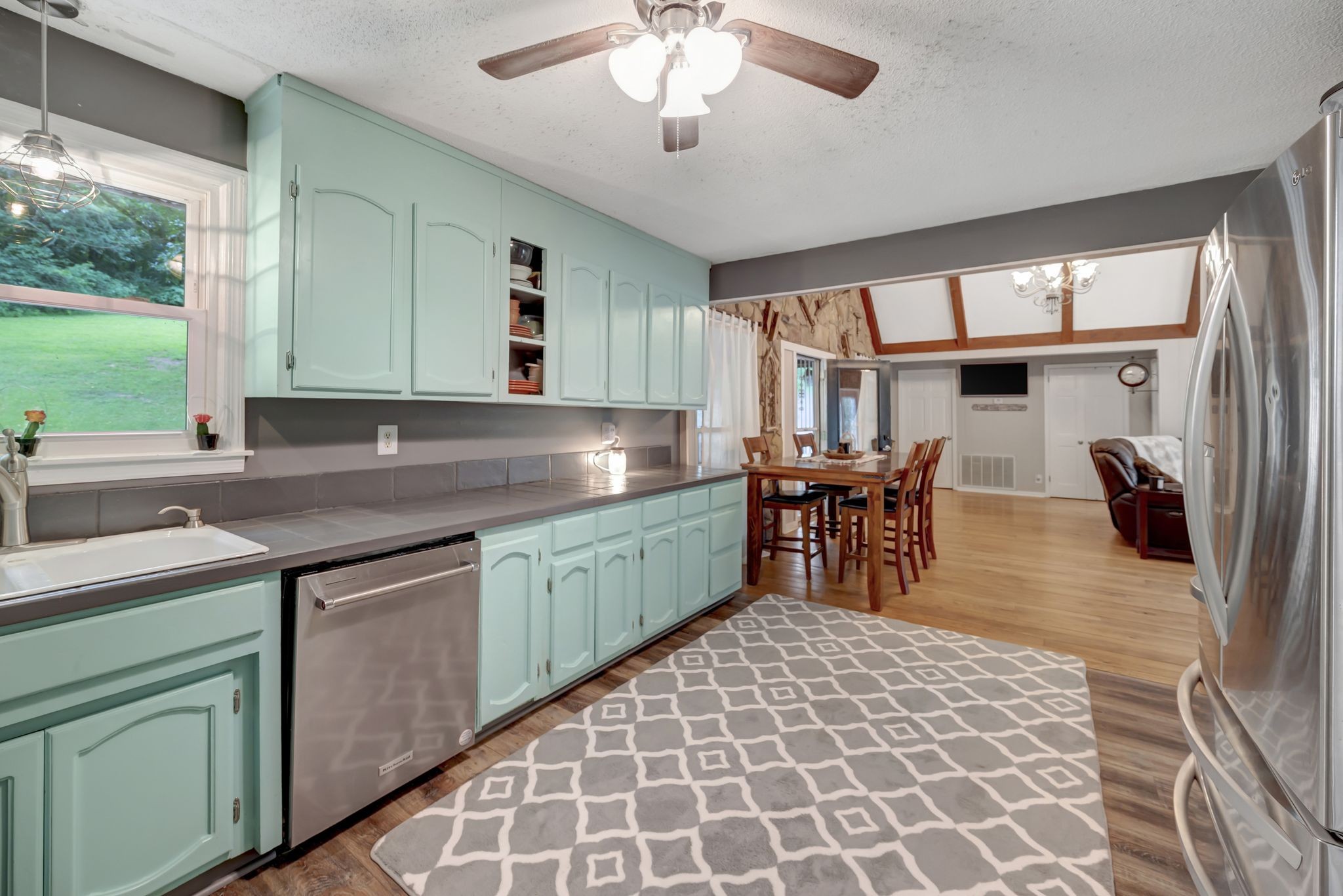 6125 Highway 41 A Pleasant View, TN 37146 - Photo 9 of 32 a kitchen with a sink and large window