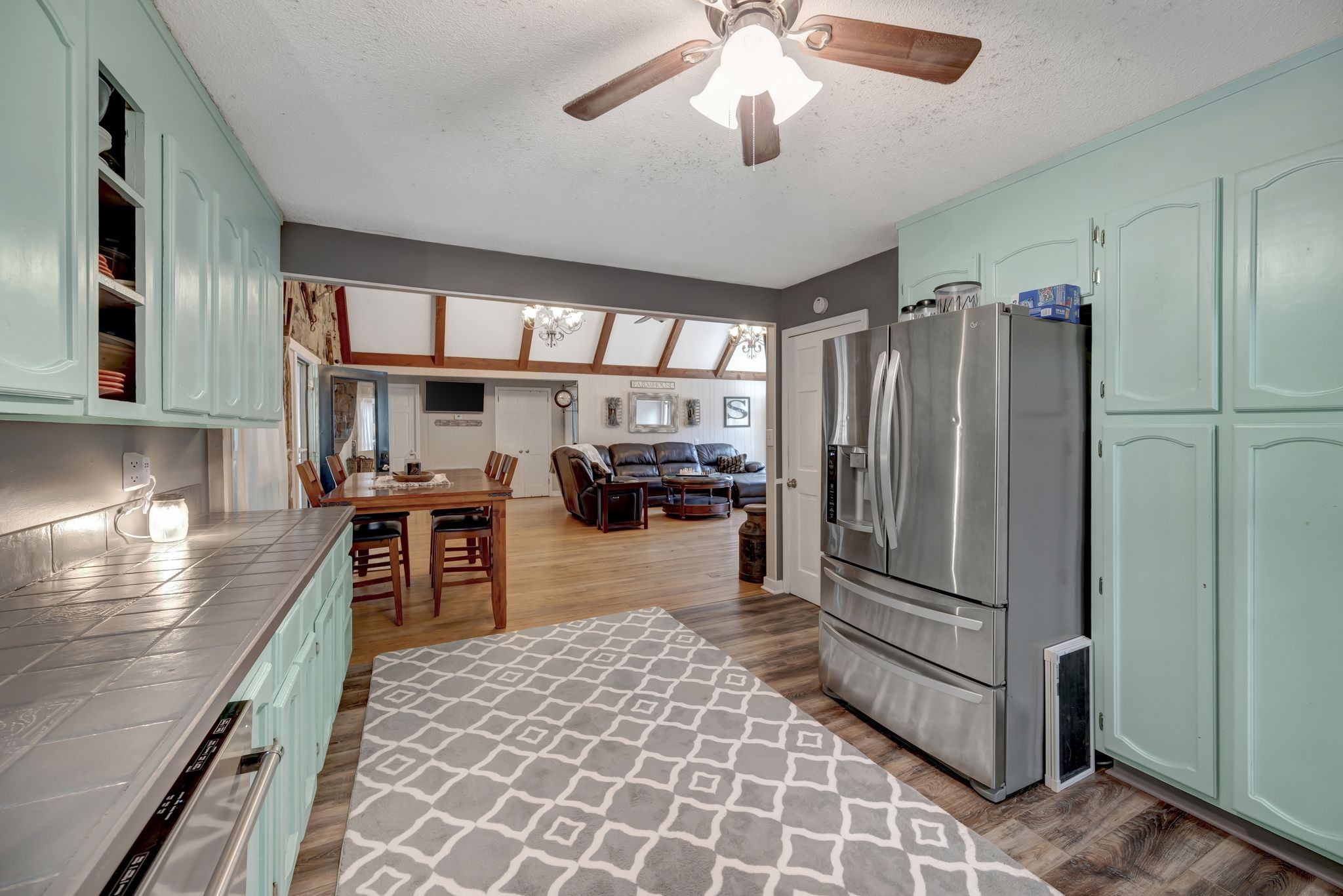 6125 Highway 41 A Pleasant View, TN 37146 - Photo 10 of 32 a kitchen with stainless steel appliances granite countertop a refrigerator a stove and a sink with cabinets