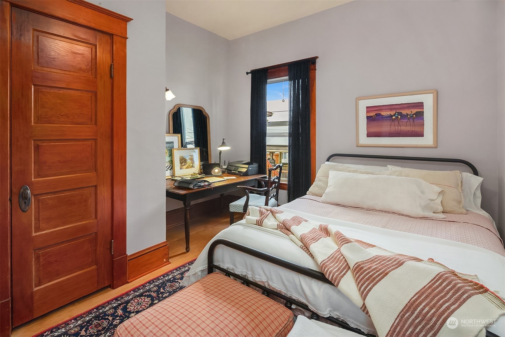 2510 Baker Avenue Everett, WA 98201 - Photo 27 of 37 a bedroom with a bed and a dresser