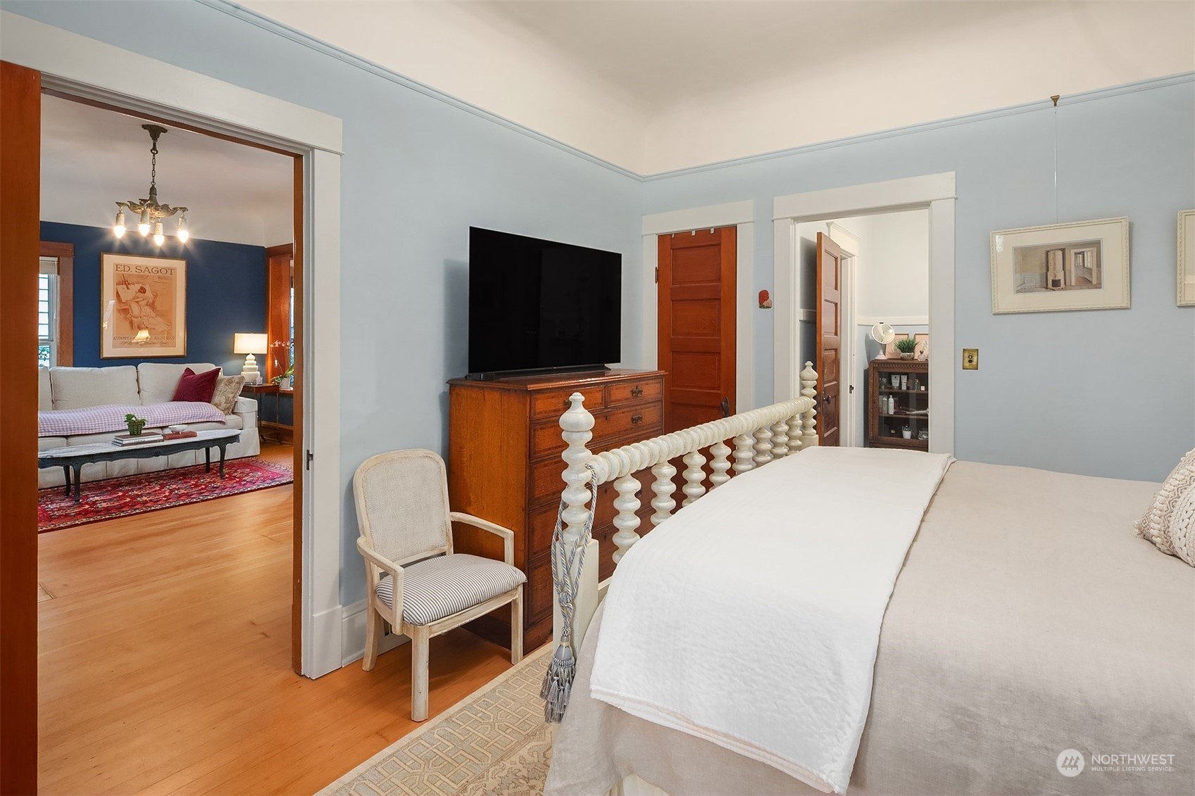 2510 Baker Avenue Everett, WA 98201 - Photo 30 of 37 a bedroom with a bed and a flat tv screen on wall