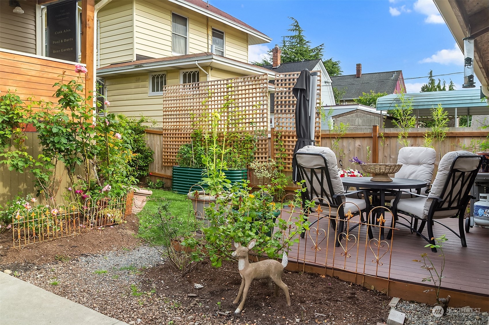 2510 Baker Avenue Everett, WA 98201 - Photo 35 of 37 a view of a patio with table and chairs and potted plants