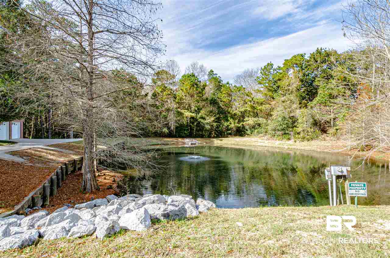 112 Mockingbird Lane Fairhope, AL 36532 - Photo 6 of 50 Home is adjacent to a 1 acre pond with fountain.