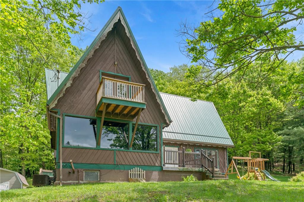 144 Church Road Rural Valley, PA 16249 - Photo 1 of 33 a aerial view of a house