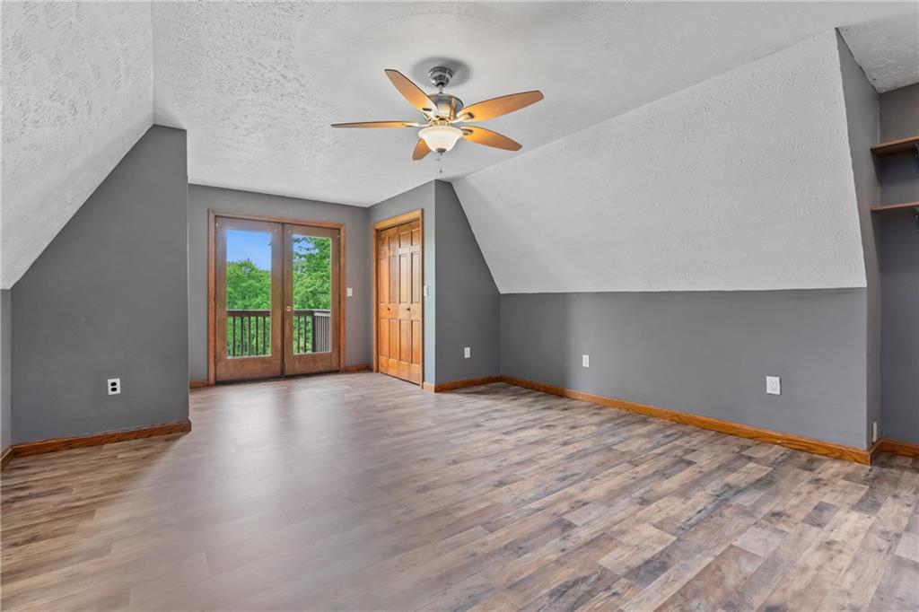144 Church Road Rural Valley, PA 16249 - Photo 11 of 33 wooden floor in an empty room with a window
