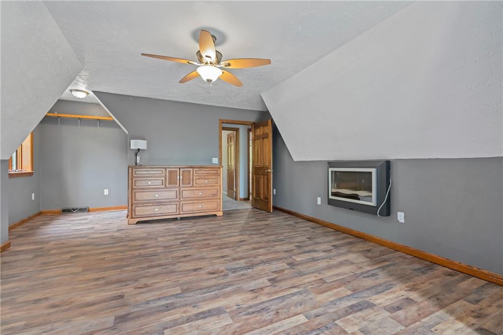 144 Church Road Rural Valley, PA 16249 - Photo 12 of 33 a view of an empty room with window and wooden floor