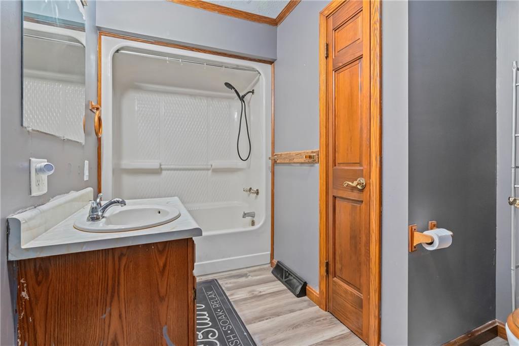 144 Church Road Rural Valley, PA 16249 - Photo 14 of 33 a bathroom with a sink a mirror and a shower