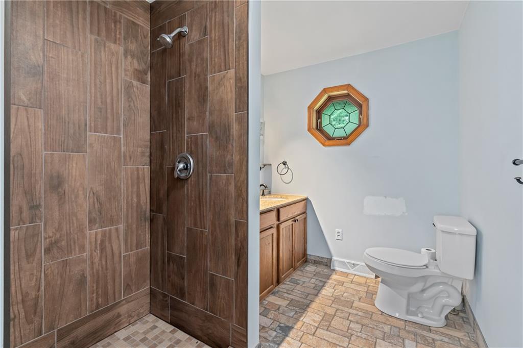 144 Church Road Rural Valley, PA 16249 - Photo 17 of 33 a bathroom with a toilet and a shower