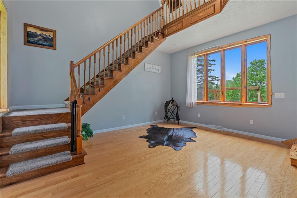 144 Church Road Rural Valley, PA 16249 - Photo 3 of 33 a view of entryway and hall with wooden floor
