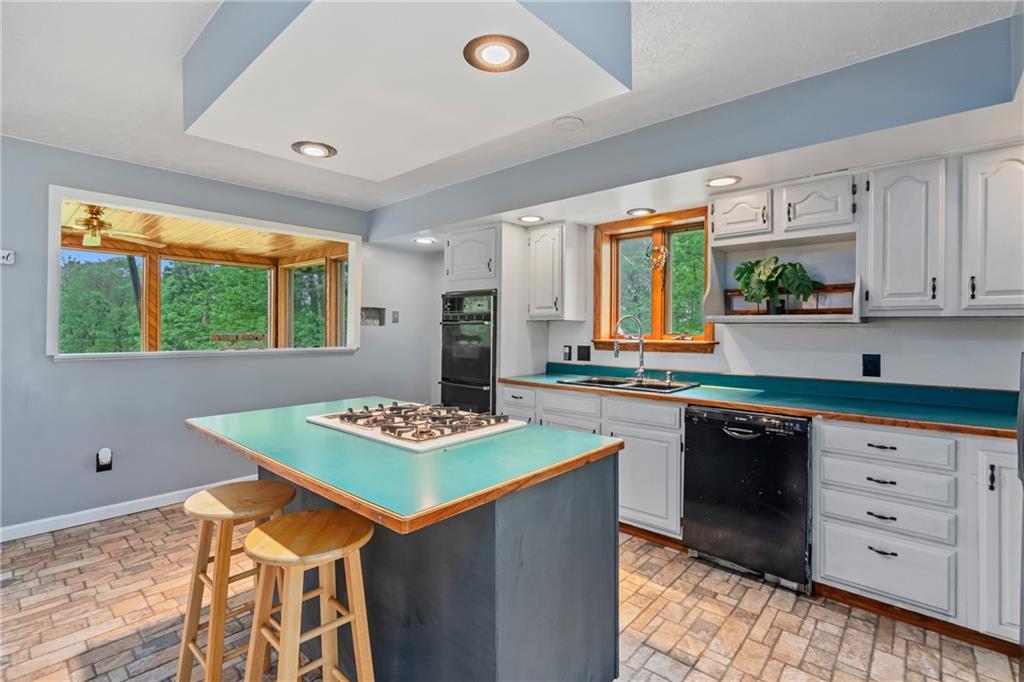 144 Church Road Rural Valley, PA 16249 - Photo 7 of 33 a kitchen with stainless steel appliances kitchen island wooden cabinets and a refrigerator