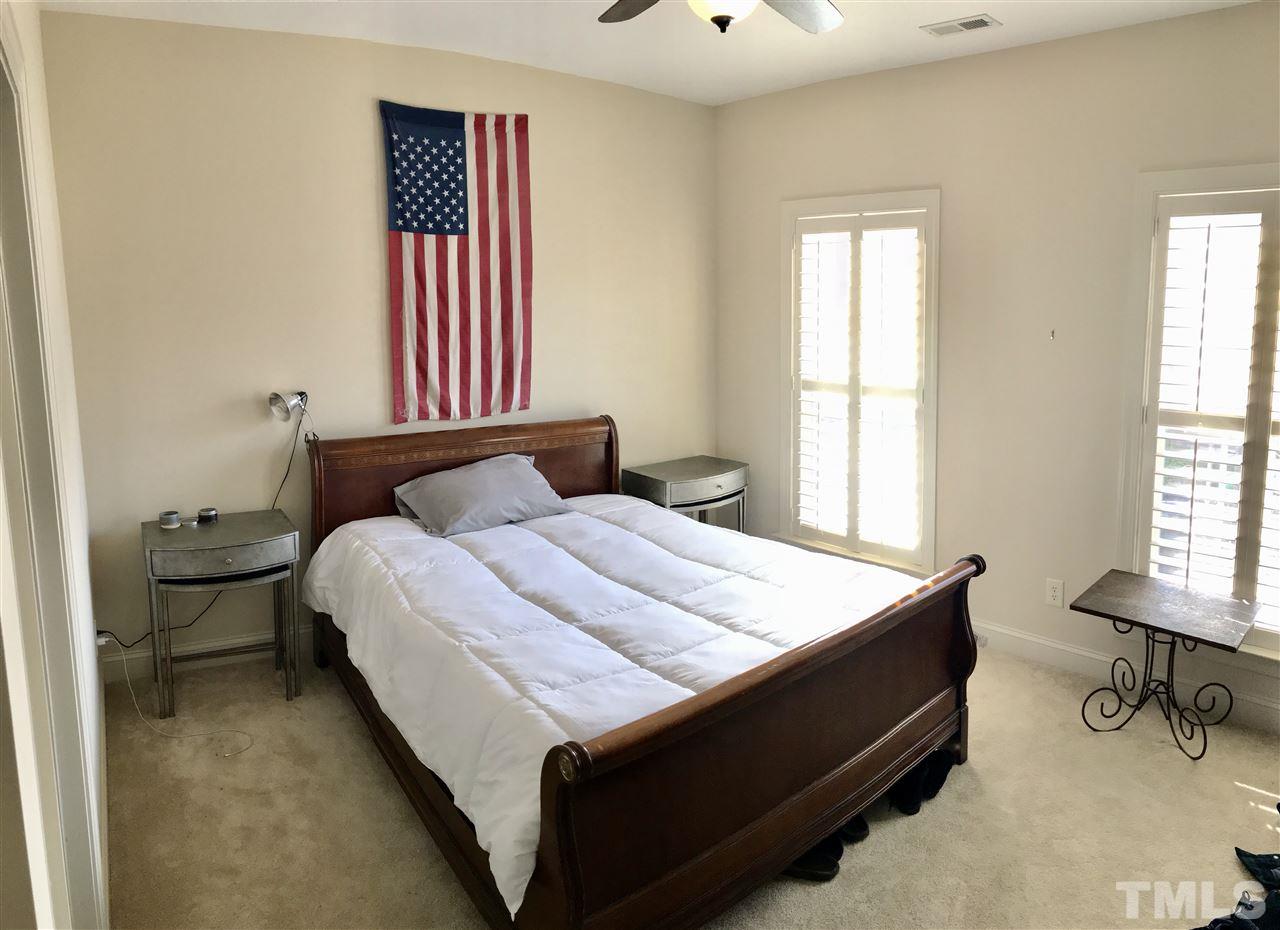 840 Historian Street Raleigh, NC 27603 - Photo 16 of 25 a bedroom with a bed and window