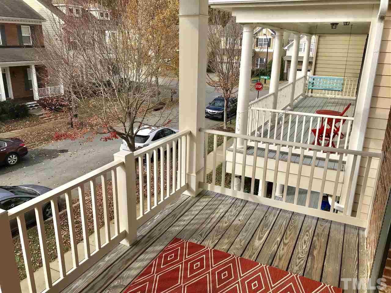 840 Historian Street Raleigh, NC 27603 - Photo 19 of 25 a view of a balcony with wooden floor