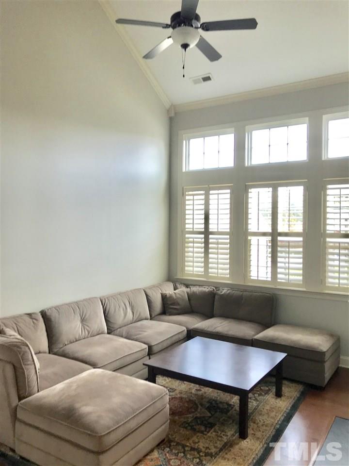 840 Historian Street Raleigh, NC 27603 - Photo 6 of 25 a living room with furniture and a window