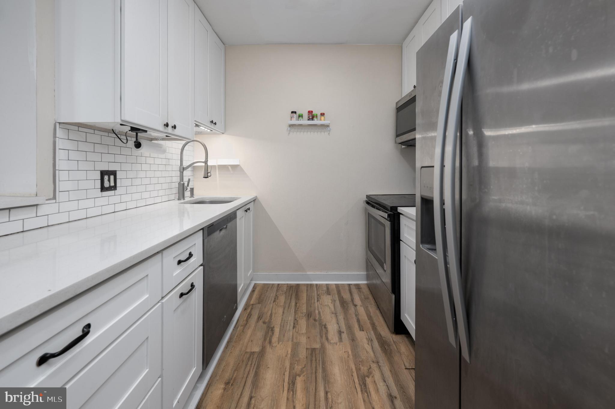 25 South Church Road, Unit 72 Maple Shade, NJ 08052 - Photo 10 of 21 Updated Kitchen with Recessed Lights & Plank Flr