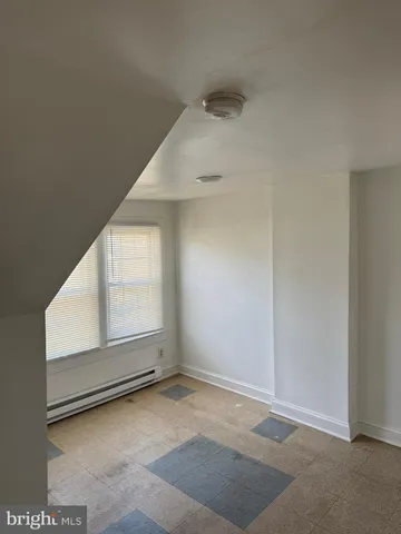 en empty room with windows