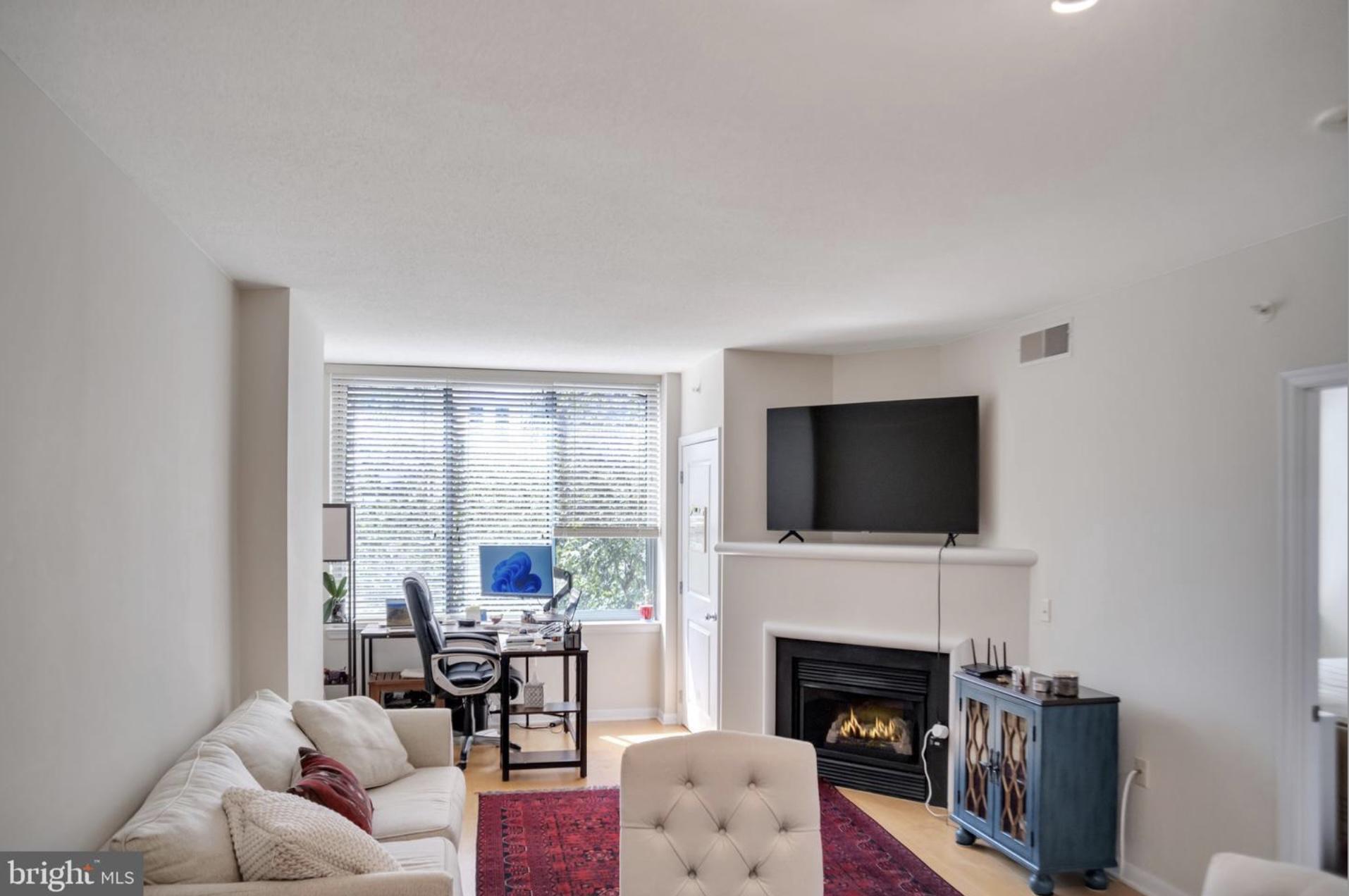 851 North Glebe Road, Unit 402 Arlington, VA 22203 - Photo 4 of 16 Bright and airy living space with tranquil views