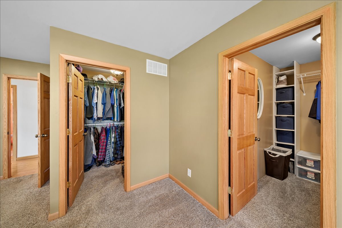2 Division Street Bristol, IL 60512 - Photo 16 of 44 a view of a hallway with closet and a living room