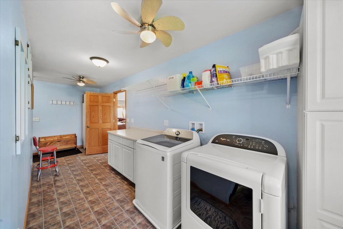 2 Division Street Bristol, IL 60512 - Photo 25 of 44 a utility room with dryer and washer