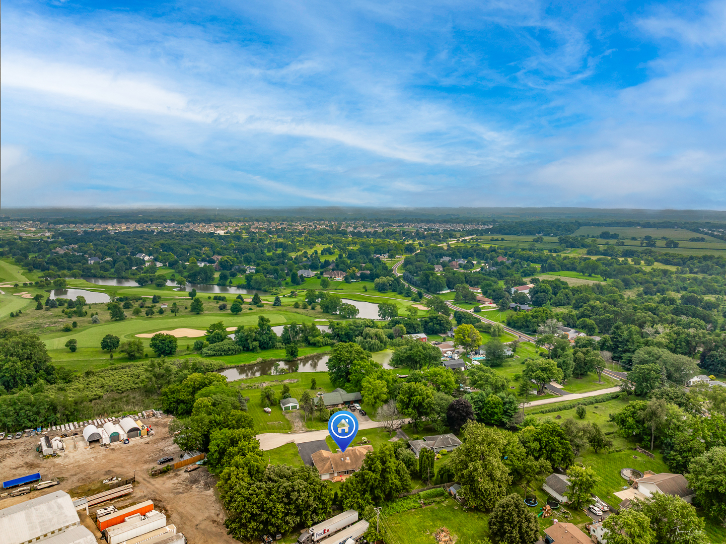 2 Division Street Bristol, IL 60512 - Photo 42 of 44 an aerial view of residential houses with outdoor space and trees