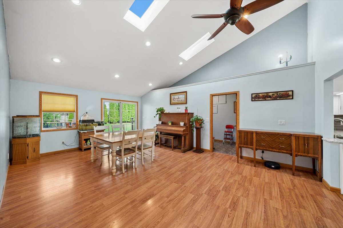 2 Division Street Bristol, IL 60512 - Photo 10 of 44 a living room with furniture and a wooden floor