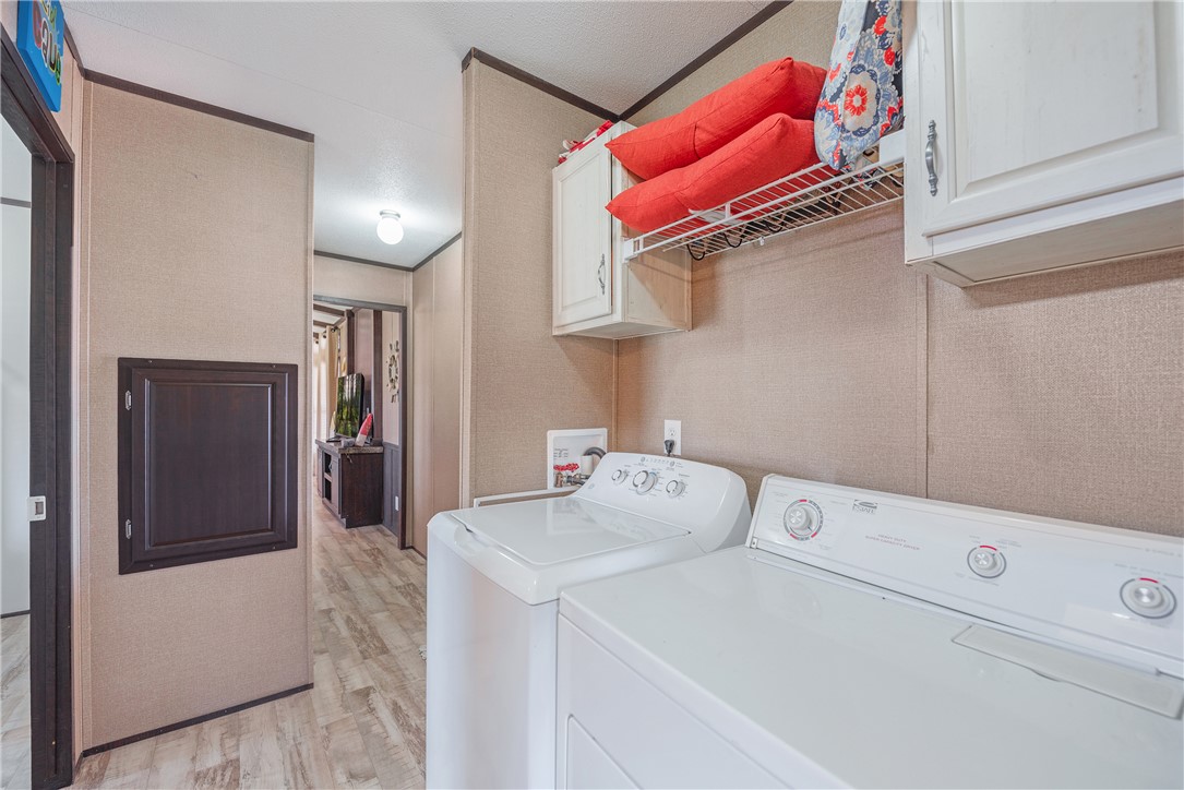 398 River Oaks Drive Trinity, TX 75862 - Photo 13 of 21 a utility room with dryer and washer