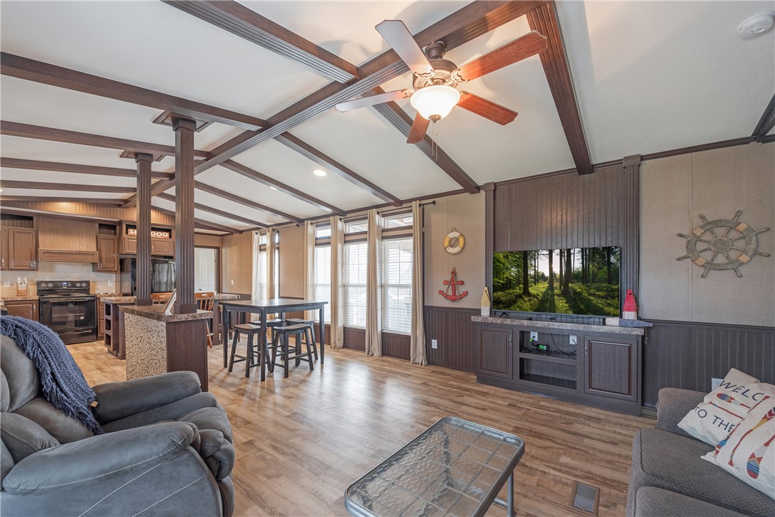 398 River Oaks Drive Trinity, TX 75862 - Photo 7 of 21 a living room with furniture and a flat screen tv