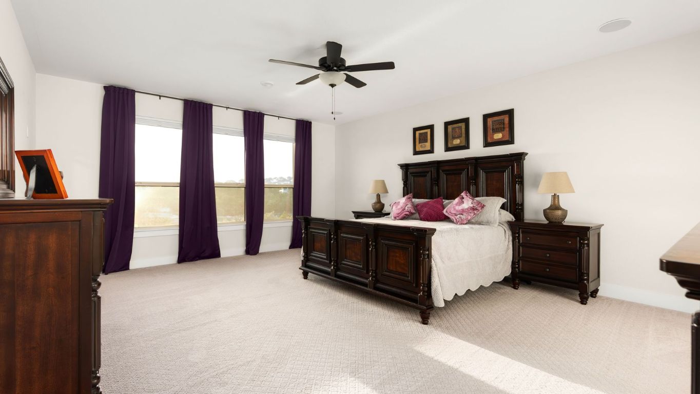 1925 Sorvino Walk Leander, TX 78641 - Photo 14 of 36 a bed room with a bed and a window