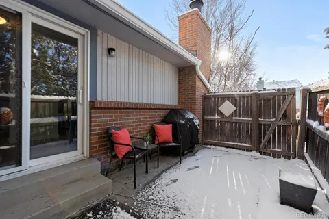 a view of a two chairs in the porch