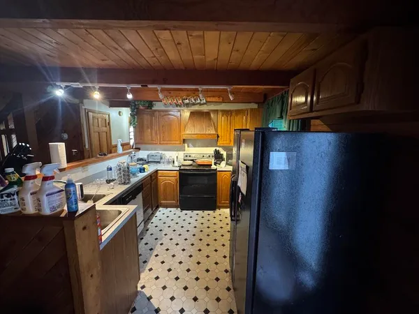 a bathroom with a sink mirror and toilet