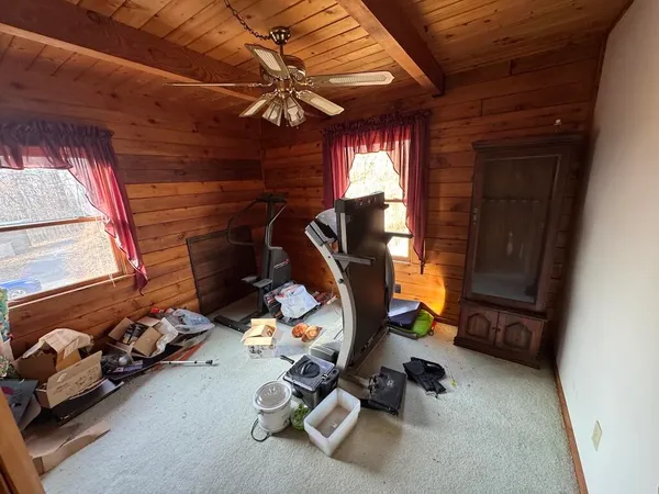 a balcony with wooden floor