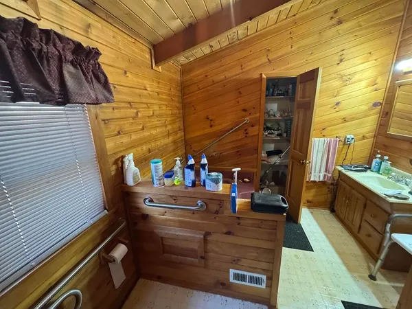 a view of path along with wooden floor