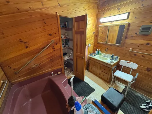 a view of a balcony with wooden floor